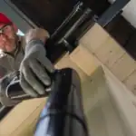 Pressure washing gutter in Stoke-on-Trent – exterior cleaning service.