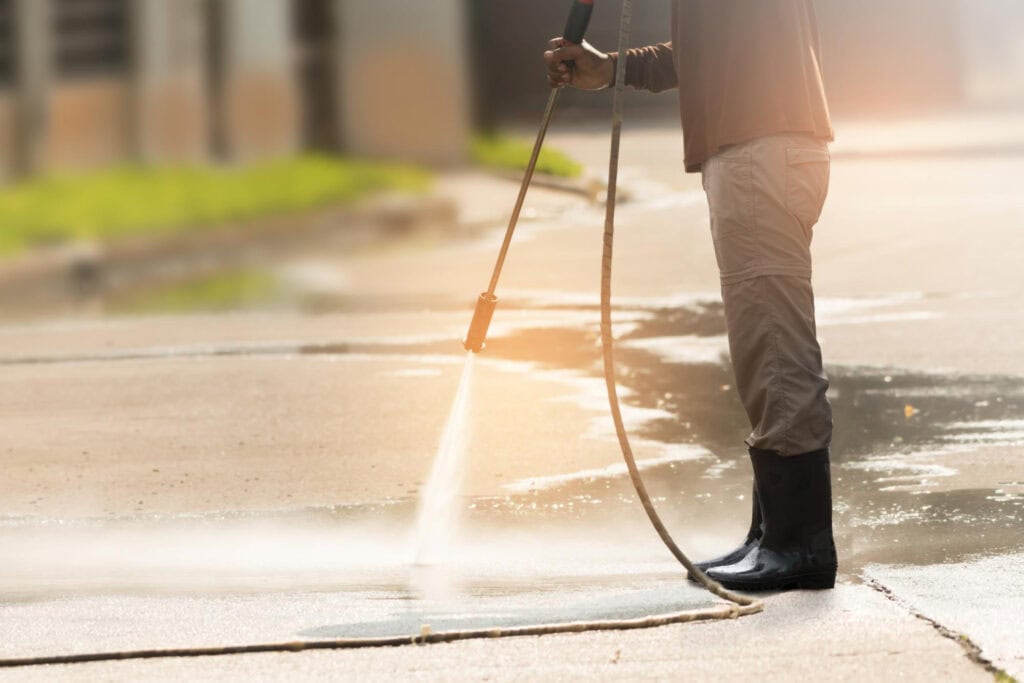Pressure washing driveway in Staffordshire – removing dirt and grime.