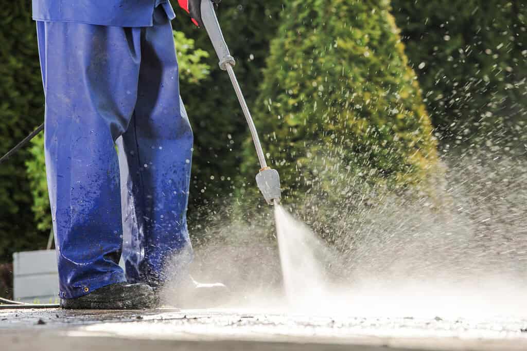 Pressure washing driveway in Staffordshire – clean and restored surface.